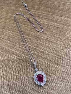 GIA Burma Ruby Pear-shape Pendant Necklace with Round Diamonds in Platinum