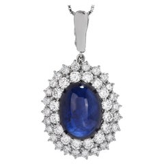 GIA Cabochon 15.92cts Blue Sapphire Diamond Platinum Double Halo Dangle Pendant Vintage GIA Cabochon 15.92cts Blue Sapphire Diamond Platinum Double Halo Dangle Pendant