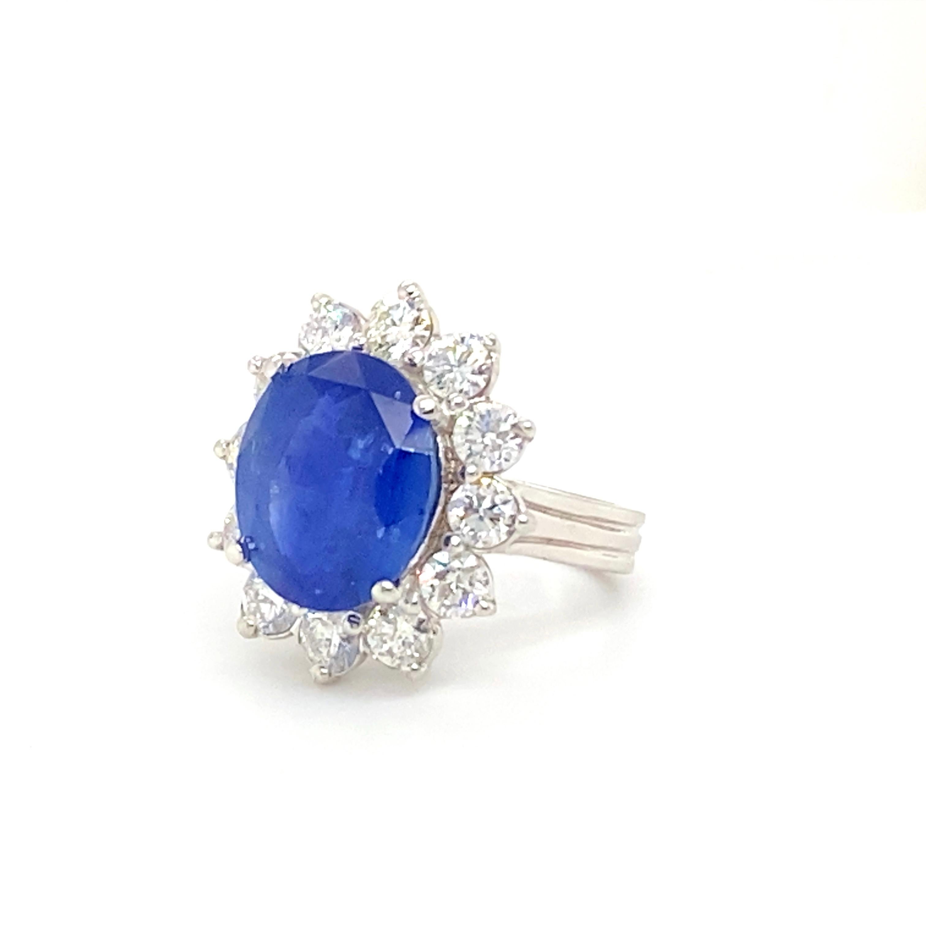 GIA Cerified 8.79 Carat Oval Ceylon Sapphire Ring Set with Diamonds For Sale 4