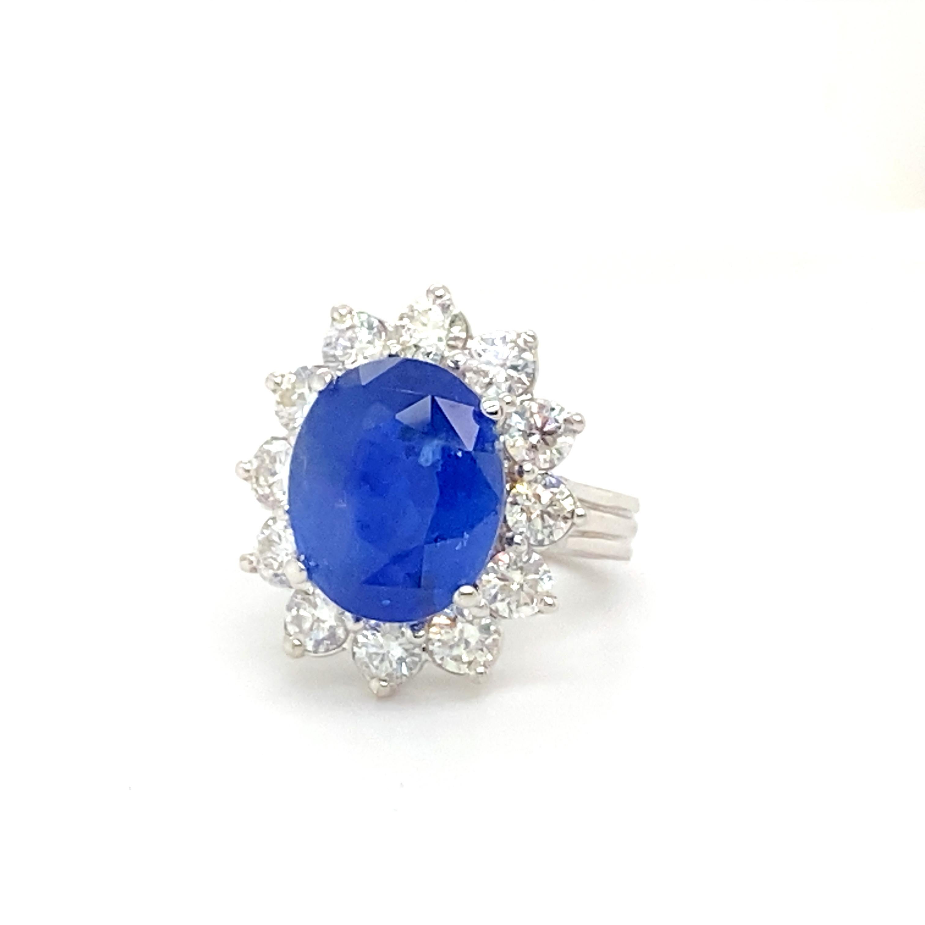 GIA Cerified 8.79 Carat Oval Ceylon Sapphire Ring Set with Diamonds For Sale 2