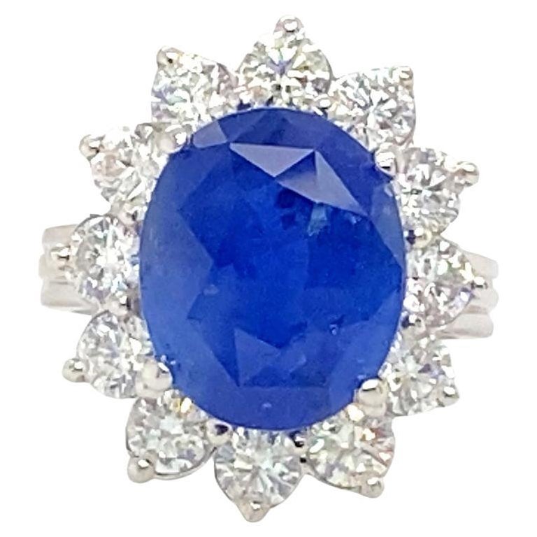 GIA Cerified 8.79 Carat Oval Ceylon Sapphire Ring Set with Diamonds For Sale