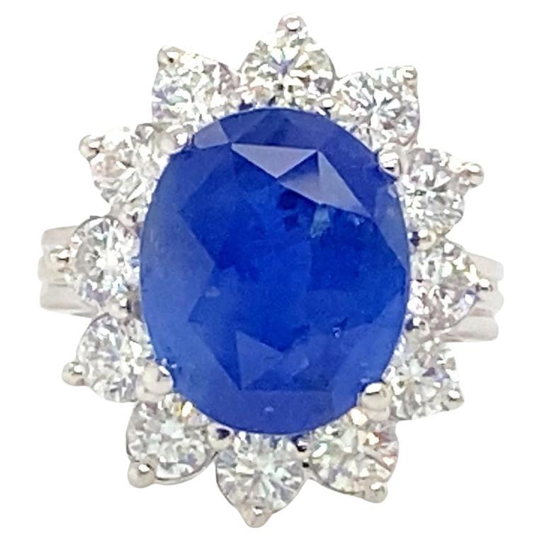 GIA Cerified 8.79 Carat Oval Ceylon Sapphire Ring Set with Diamonds For Sale