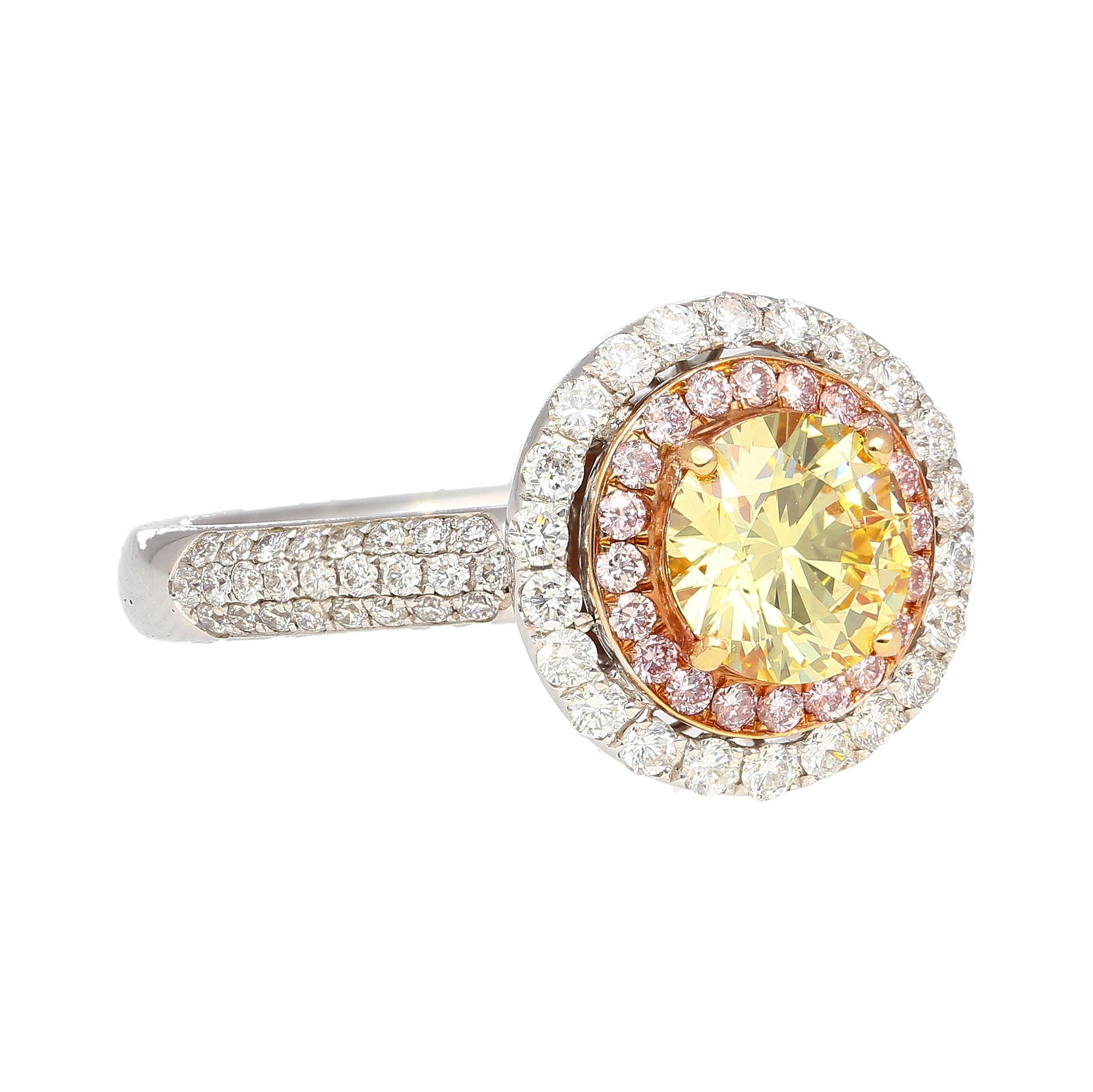 GIA certified 1.01 carat fancy yellow round brilliant cut diamond center stone ring, set in 18k solid gold. Set with a three-tone gold setting. A white gold shank, rose gold halo, and yellow gold prongs. A gorgeous contact of colors complementing