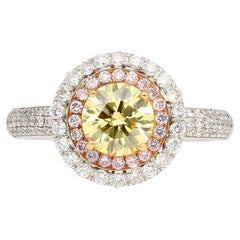 Used GIA Cert 1.01 Carat Round Cut Fancy Yellow Diamond Ring in 18KW Multi Stone Halo