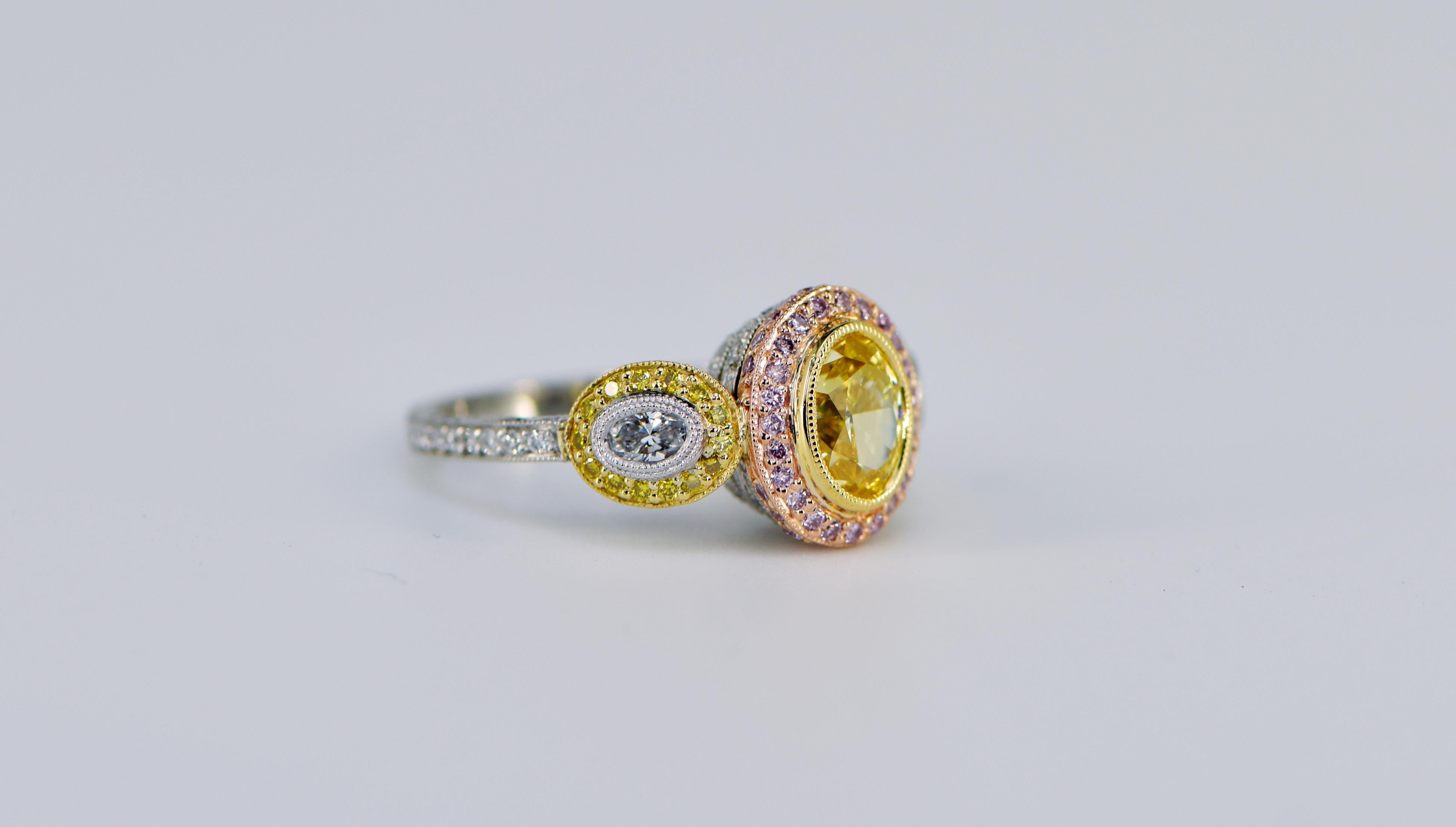 This exquisite GIA certified diamond ring is a true work of art, featuring a stunning 1.27ct oval fancy intense yellow diamond set in the luxurious metal of platinum. The stunning center diamond is accentuated by two matching white oval diamonds,