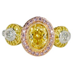 GIA Cert 1.27ct Oval Fancy Intense Yellow Platinum Diamond Ring GIA Cert 1.27ct Oval Fancy Intense Yellow Platinum Diamond Ring