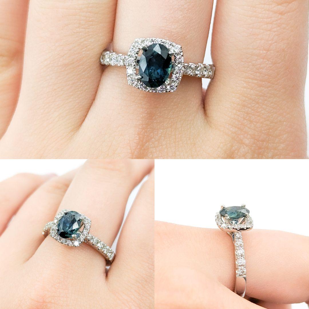 GIA Cert 1.43ct Montana Sapphire & Diamond Halo Ring in Platinum

Introducing this exquisite ring crafted in 950 platinum. The ring features a stunning 1.43ct Montana sapphire centerpiece, celebrated for its unique blue-green hue and rarity. Montana