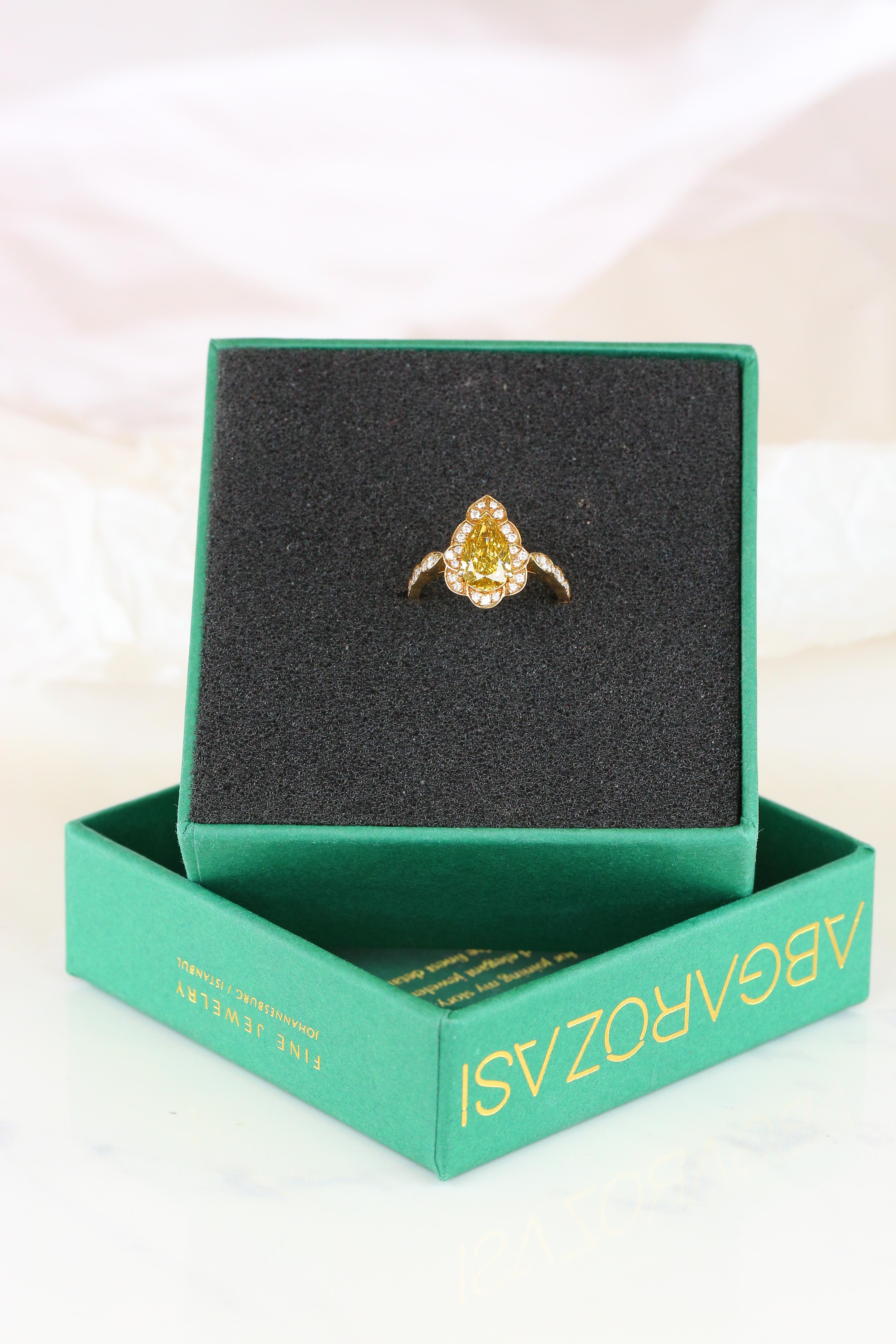 For Sale:  GIA Cert 18K Gold 1.53 ct. Pear Shape Fancy Yellow Diamond Solitaire Bridal Ring 14