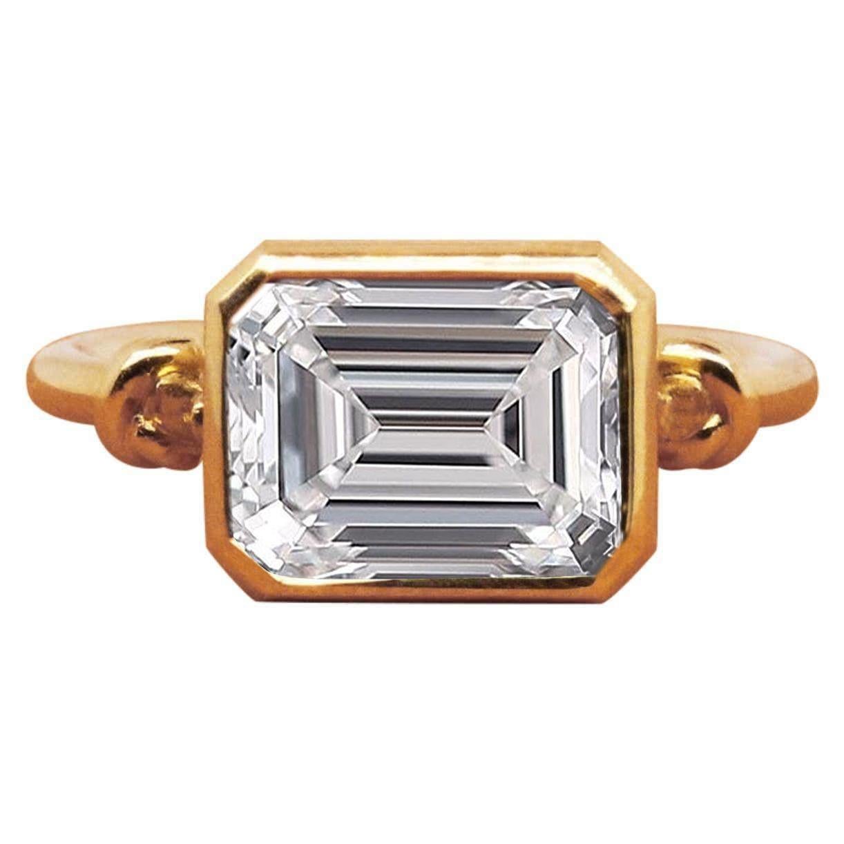 bezel set emerald cut diamond ring