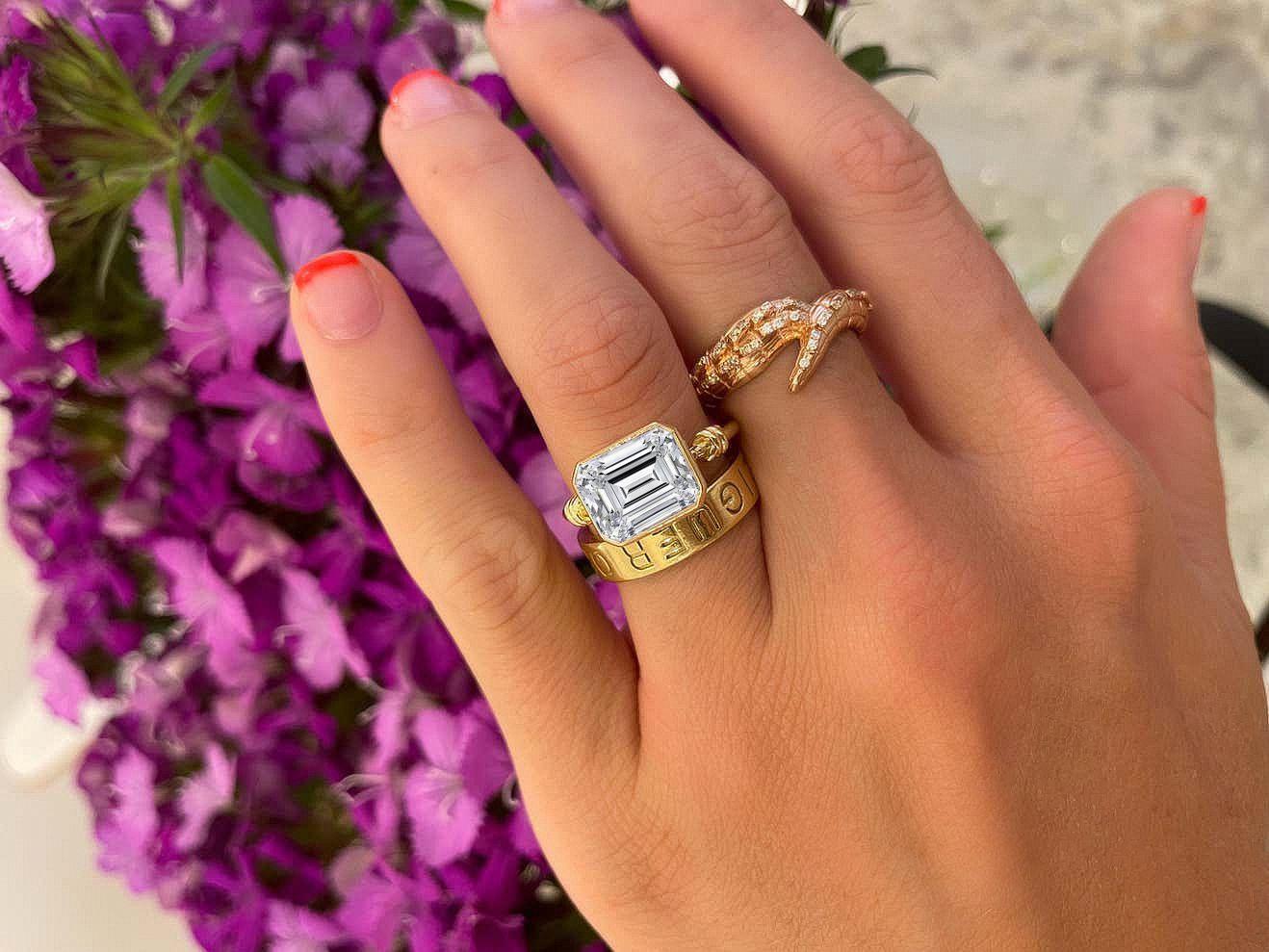 bezel set emerald ring