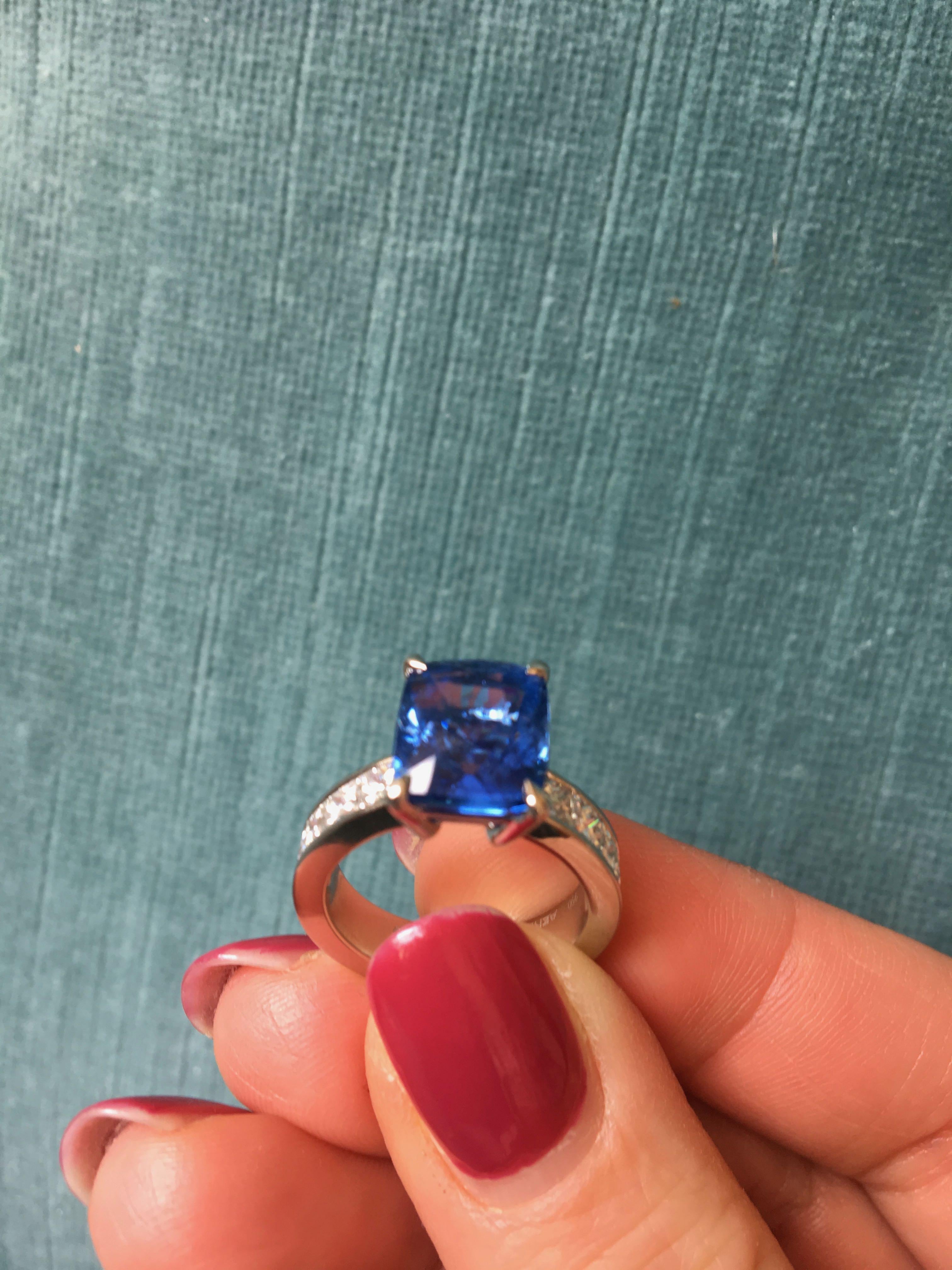 This beautiful Natural Ceylon Sapphire Cushion Cut Ring with white diamonds is handcrafted in Platinum. It is the perfect engagement ring. 

Gemstone: Ceylon Saphire 7,03ct. (GIA Cert.) 
Paving: White Diamonds 1,56ct.
Material: Platinum 950
Ring