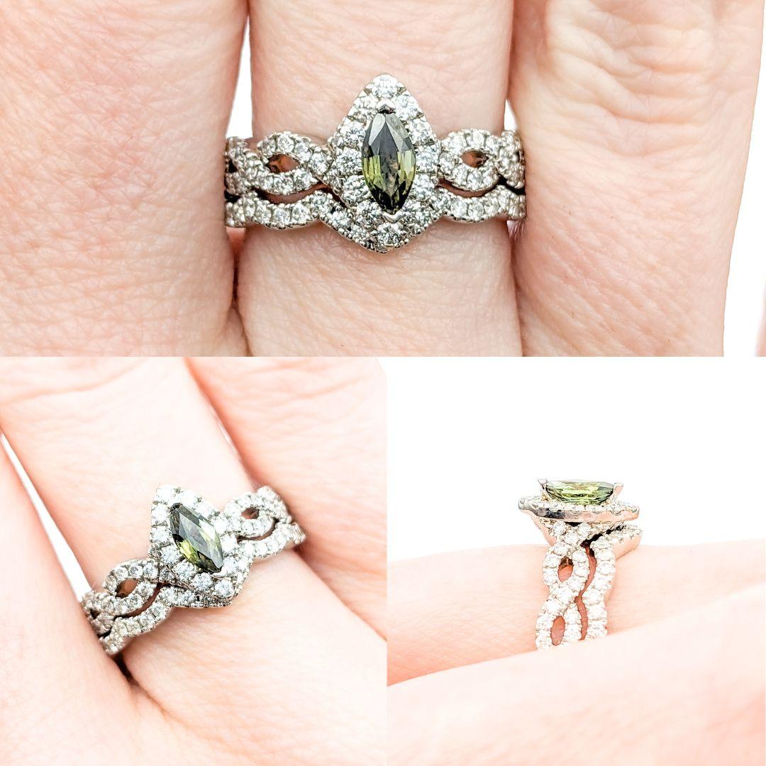 GIA Cert Natural Alexandrite & Diamond Engagement Ring In White Gold

Introducing this beautiful Diamond Engagement Ring, crafted in 14kt white gold. This exquisite ring features a .32ct natural Alexandrite certified by GIA and .85ctw of SI clarity
