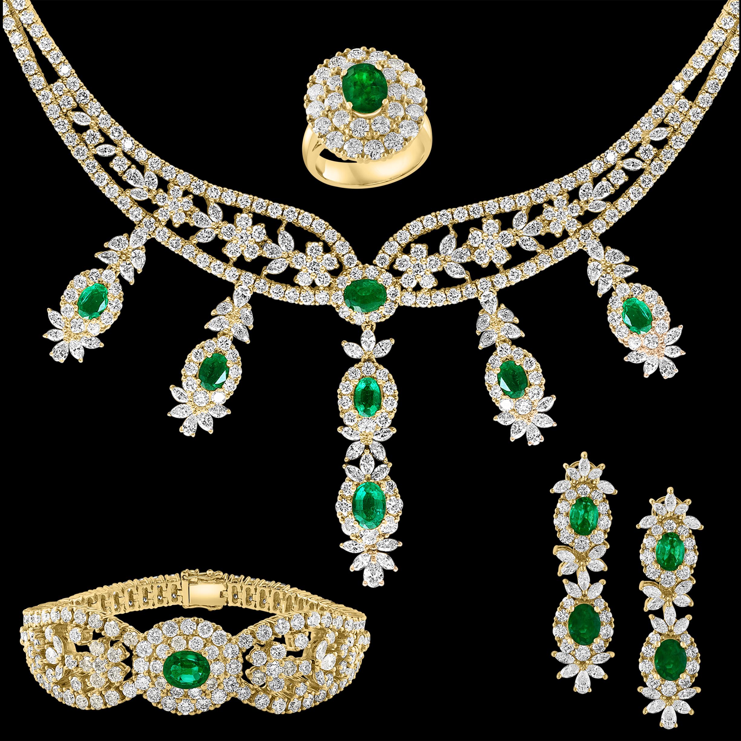 GIA Certified  Natural Finest Zambian Emeralds & 95 Carat Diamonds 4 Piece Set  Necklace, Bracelet , Earring and Ring Suite 18 Karat Yellow Gold 253 Gm Signed Marconi
Necklace consisting of 7 solitaire  natural Emeralds. There are total 13 emeralds