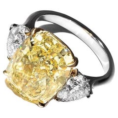 Used GIA Certied 5.52 Carat Fancy Yellow Elongated Cushion Cut Diamond Ring