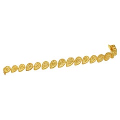 Bracciale da tennis con aureola gialla di fantasia con taglio a pera certificato GIA 35 carati