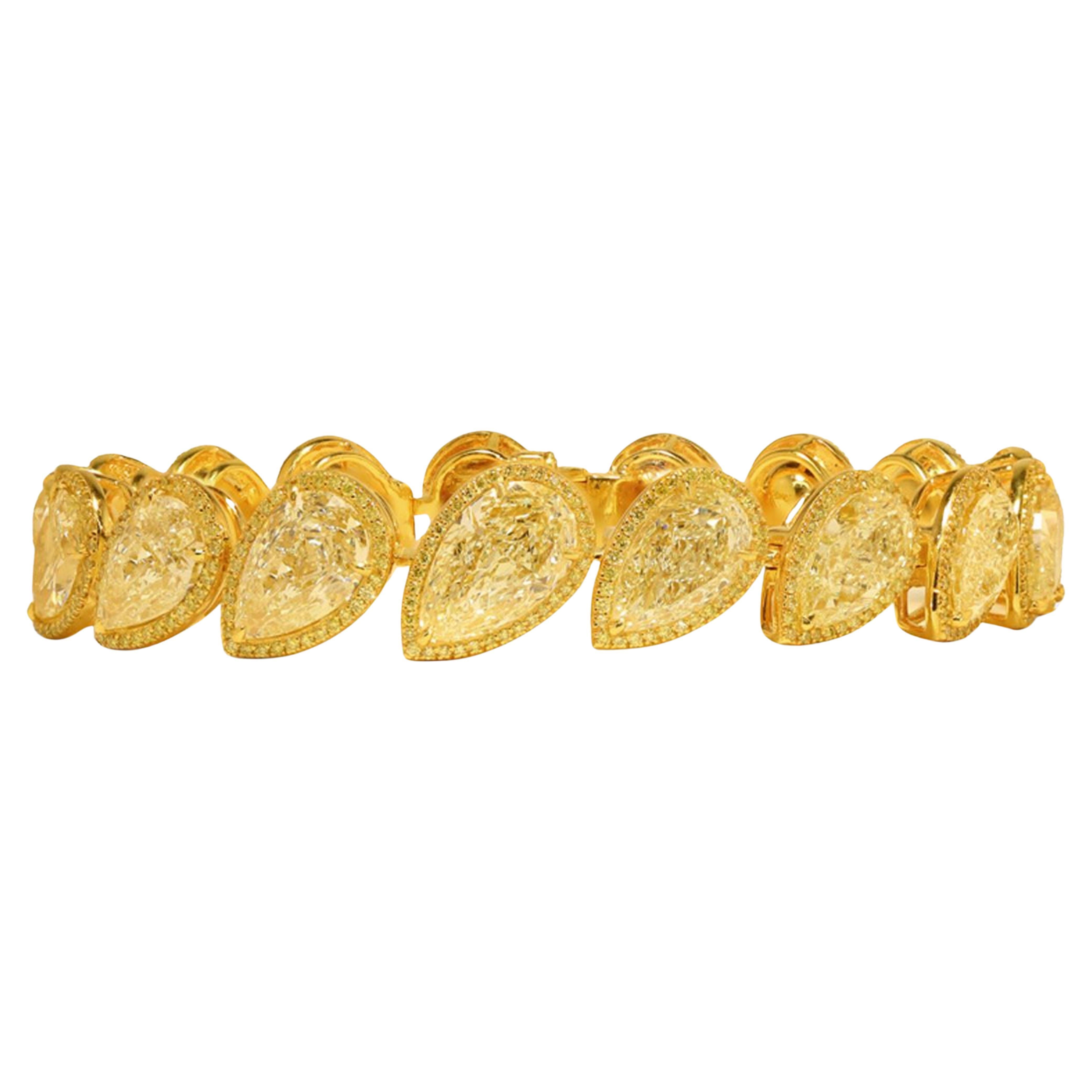 GIA Certified 35 Carat Pear Cut Fancy Yellow Halo Tennis Bracelet In New Condition For Sale In Rome, IT