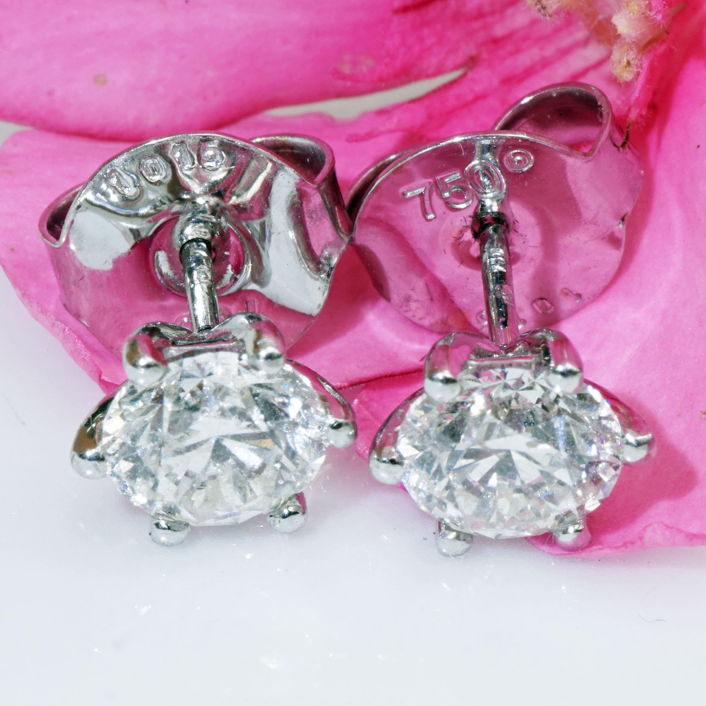 the jewelry dream of most women, one time solitaire brilliant stud earrings for the ears, the perfect piece of jewelry for a lifetime, GIA certified full cut brilliant total approx 2.03 ct, W (white H) / SI2 (small inclusions), cut very good, in 750