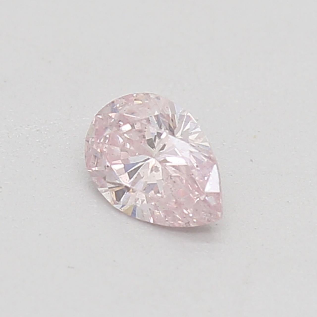 Pear Cut GIA Certified 0.13 Carat Fancy Light Yellow SI1 Clarity Diamond For Sale