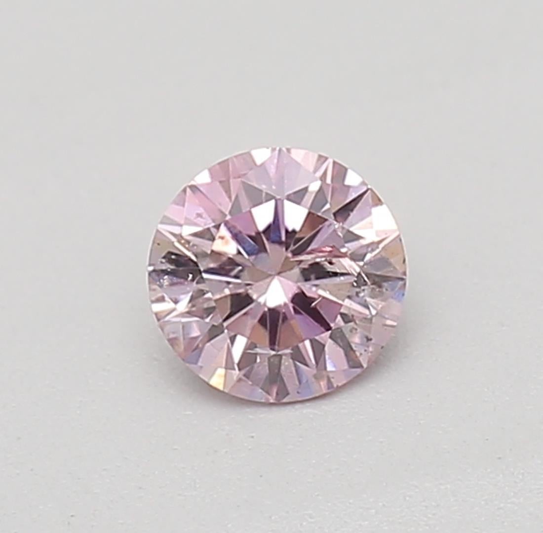Certificate: GIA 
Report Number: 6185915645
Shape And Cut: Round
Carat Weight: 0.15 carat
Measurements: 3.43 x 3.40 x 2.05 mm
Color Grade: Fancy Intense Purplish Pink 

FEATURES OF THE DIAMOND:

This Fancy Intense Purplish Pink Diamond is a rare and
