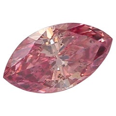 Diamante certificado por GIA de 0,16 quilates de color rosa intenso con claridad SI2