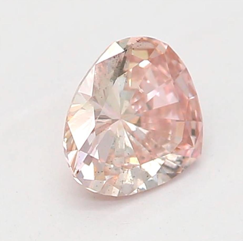 Certificate: GIA
Report Number:  2201158079
Shape And Cut: Heart
Carat Weight: 0.20 carat
Measurements: 3.71X4.39X2.05mm
Color Grade: Fancy Light Brownish Pink

FEATURES OF THE DIAMOND:

This Fancy Light Brownish Pink diamonds possess a subtle yet