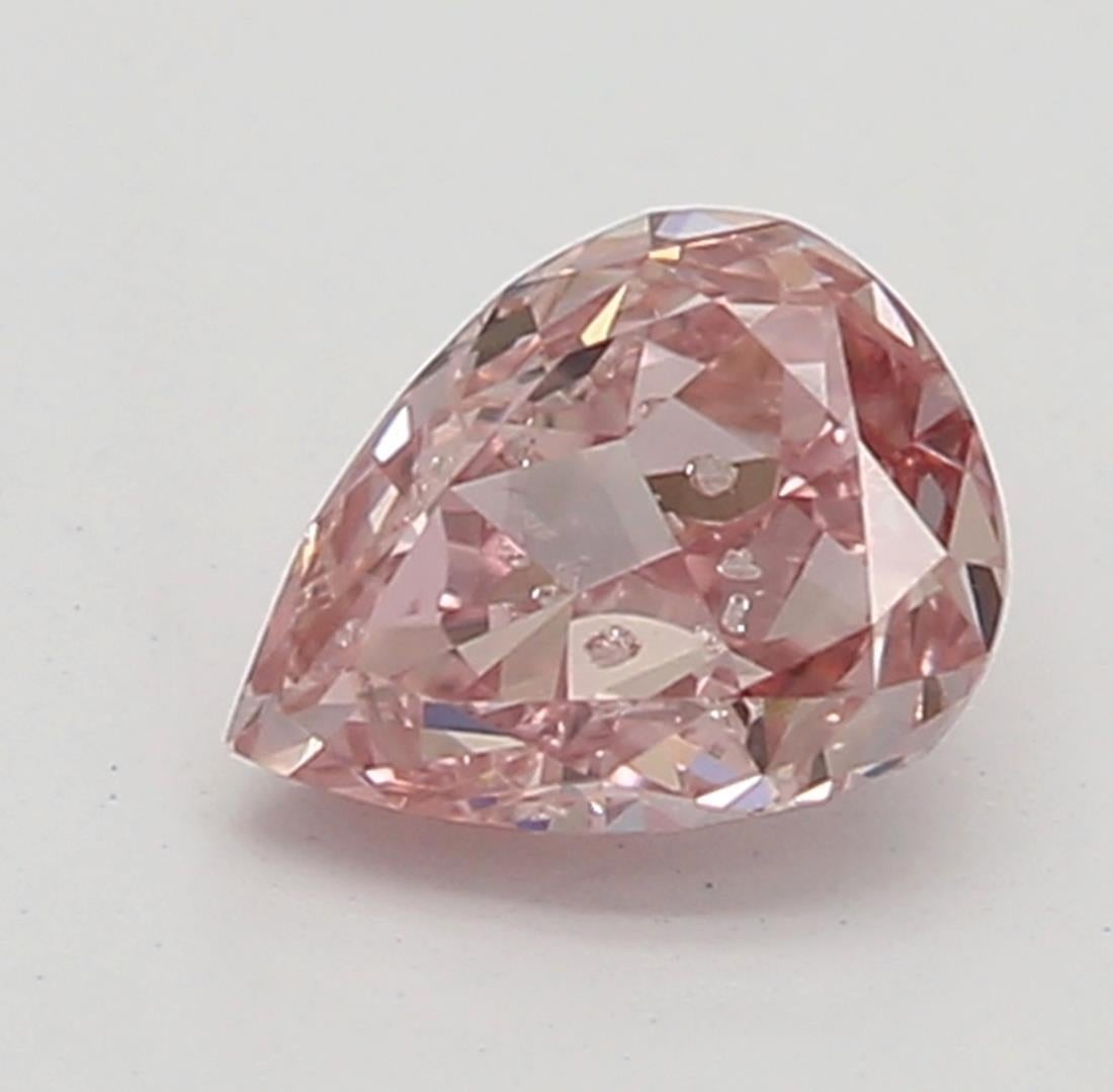 Certificate: GIA 
Report Number: 6185862926
Shape And Cut: Pear
Carat Weight: 0.21 carat
Measurements: 4.25 x 3.31 x 2.07 mm
Color Grade: Fancy Intense Pink

FEATURES OF THE DIAMOND:

This Fancy Intense Pink Diamond is a highly prized diamond known