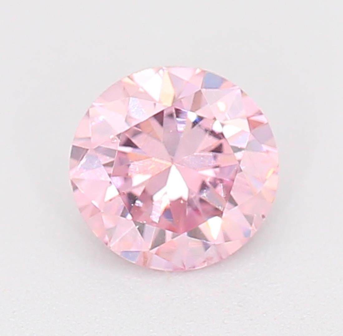 Certificate: GIA
Report Number: 6204649991
Shape And Cut: Round
Carat Weight: 0.21 carat
Measurements: 3.85 x 3.88 x 2.37 mm
Color Grade: Fancy Orangy Pink 

FEATURES OF THE DIAMOND:

This fancy orangy pink diamond is an extraordinary diamond with a