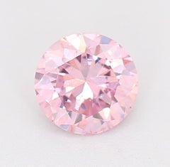 GIA Certified 0.21 Carat Fancy Orangy Pink SI1 Clarity Diamond