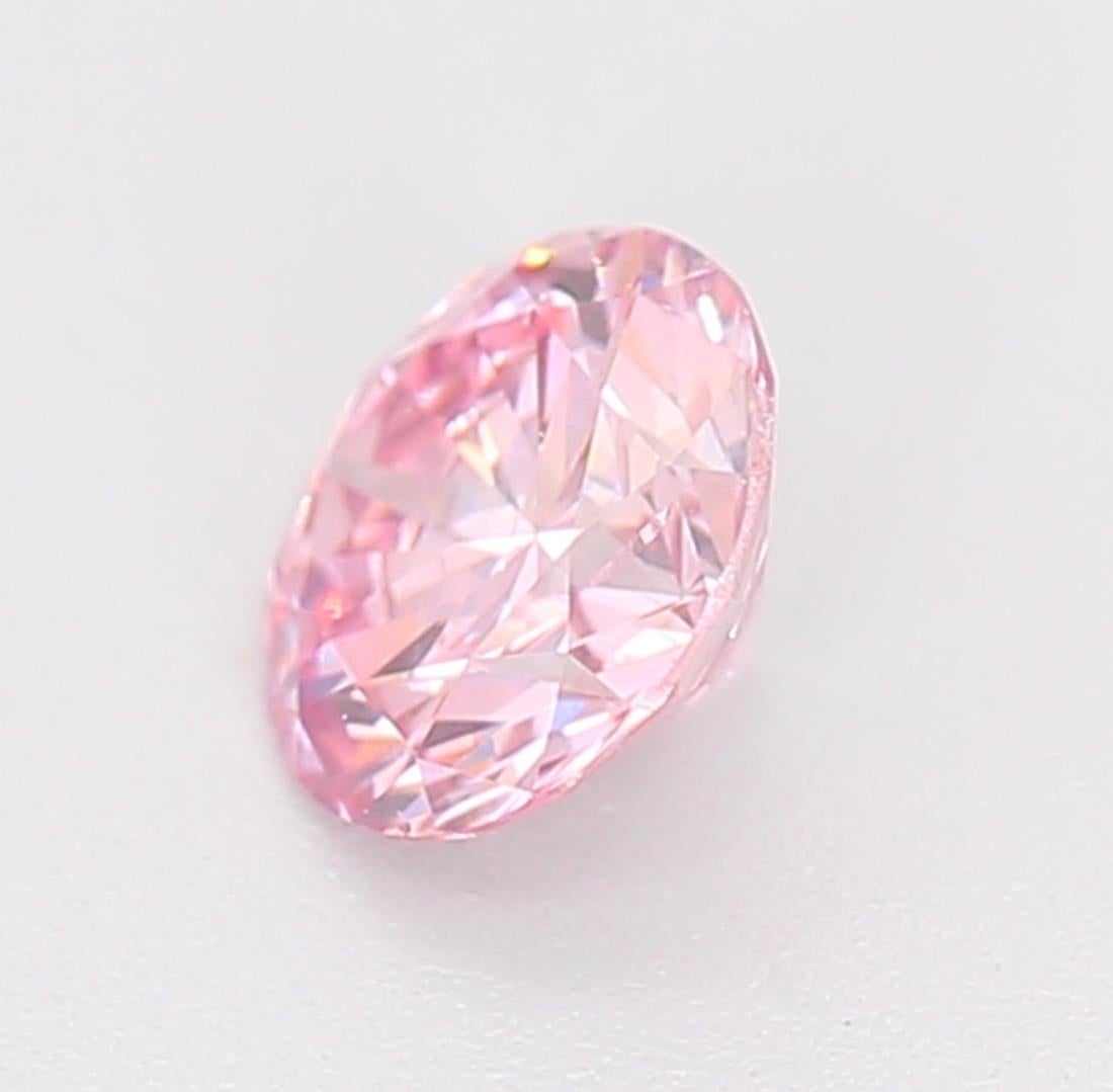 Round Cut GIA Certified 0.21 Carat Fancy Orangy Pink SI1 Clarity Diamond For Sale