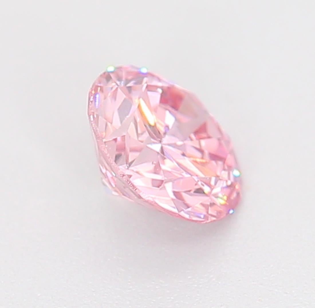 Women's or Men's GIA Certified 0.21 Carat Fancy Orangy Pink SI1 Clarity Diamond For Sale