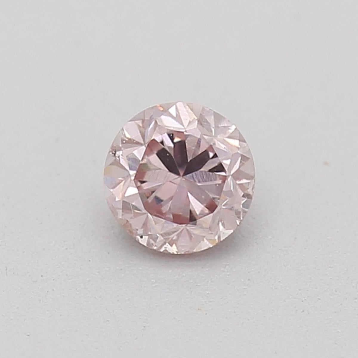 Certificate: GIA
Report Number: 7228746748
Shape And Cut: Round
Carat Weight: 0.22 carat
Measurements: 3.50-3.54x2.56 mm
Color Grade: Fancy Pink 

FEATURES OF THE DIAMOND:

Our fancy pink, color diamond is a captivating diamond that combines the