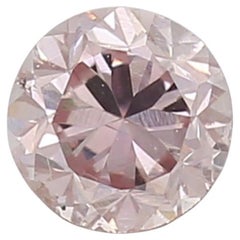 Diamante certificado por GIA de 0,22 quilates de color rosa fantasía con claridad SI2