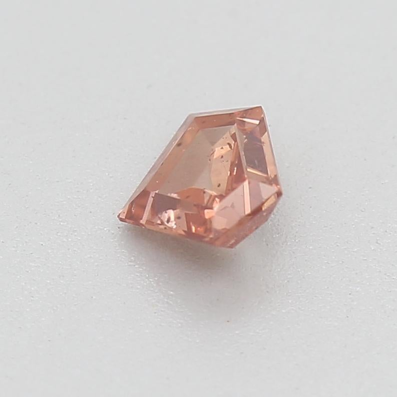Shield Cut GIA Certified 0.23 Carat Fancy Deep Orangy Pink SI2 Clarity Diamond For Sale