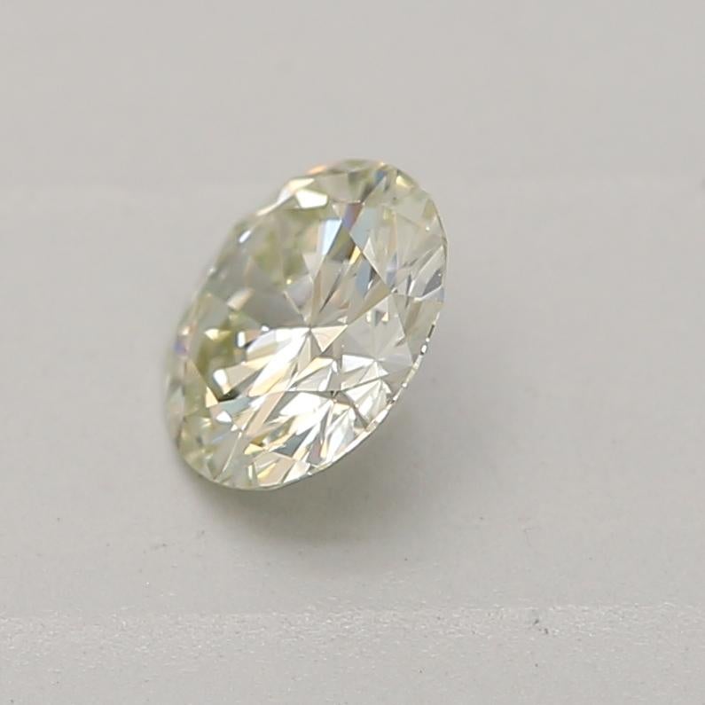 Round Cut GIA Certified 0.25 Carat Faint Yellow Green SI1 Clarity Diamond For Sale