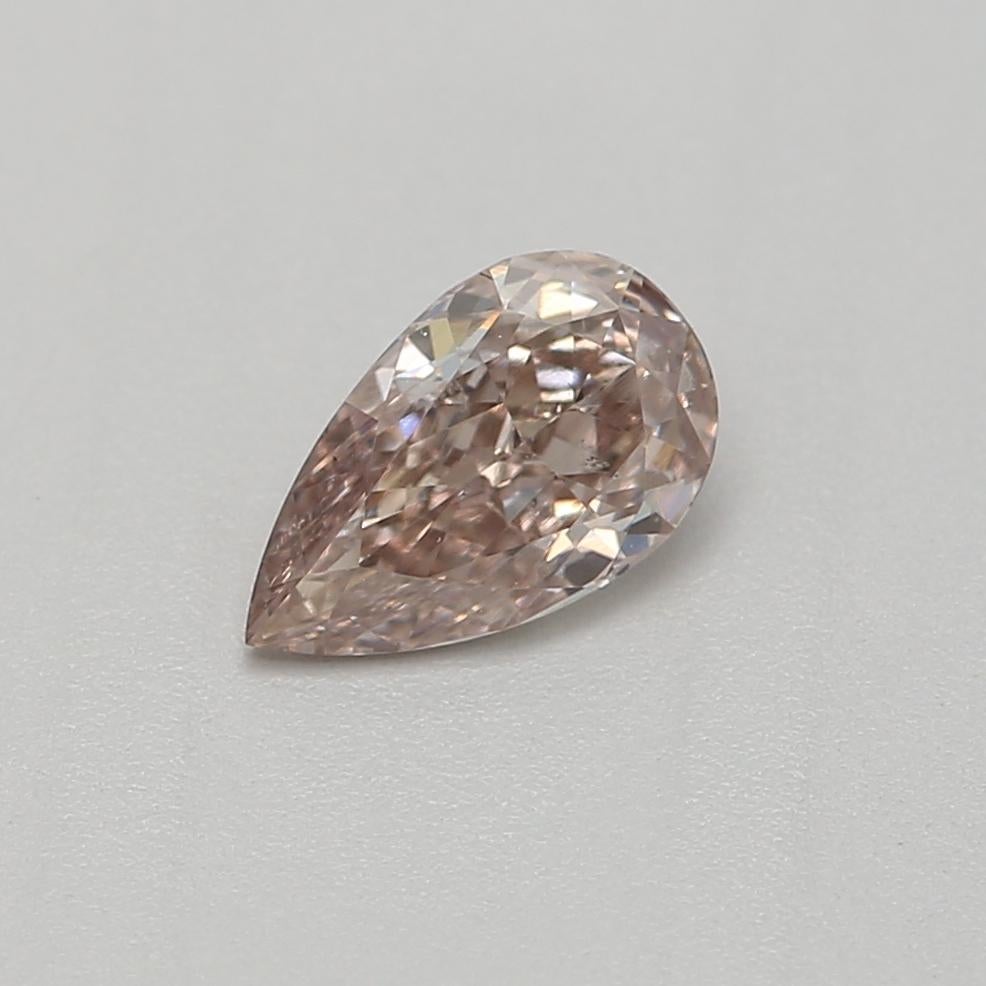 Certificate: GIA 
Report Number: 1433914743
Shape And Cut: Pear
Carat Weight: 0.25 carat
Measurements: 5.65 x 3.41 x 2.01 mm
Color Grade: Fancy Pinkish Brown

FEATURES OF THE DIAMOND:

This Fancy Pinkish Brown diamond is a unique and captivating
