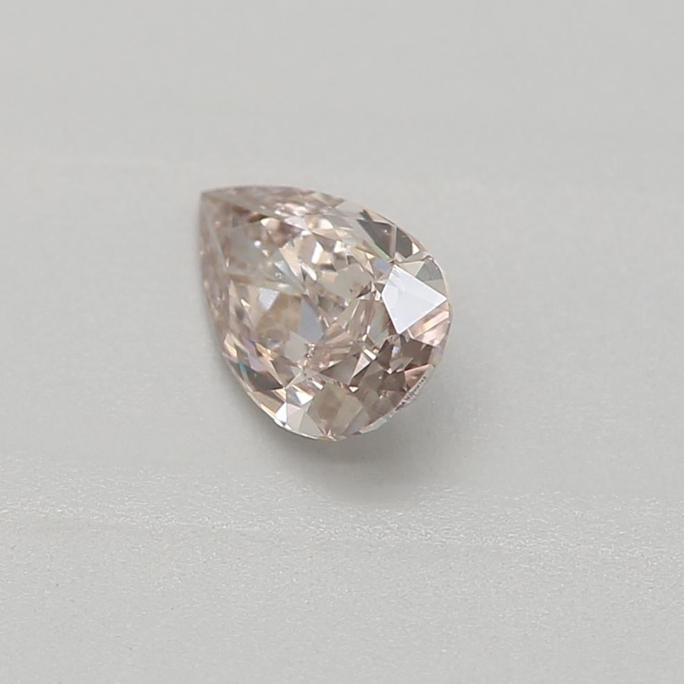 Pear Cut GIA Certified 0.25 Carat Fancy Pinkish Brown SI2 Clarity Diamond For Sale