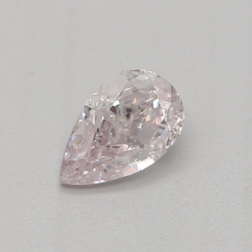 Certificate: GIA 
Report Number: 7436492073
Shape And Cut: Pear 
Carat Weight: 0.25 carat
Measurements: 5.06 x 3.21 x 2.10 mm
Color Grade: Light Pink

FEATURES OF THE DIAMOND:

This light pink diamond is a rare and enchanting diamond that features a