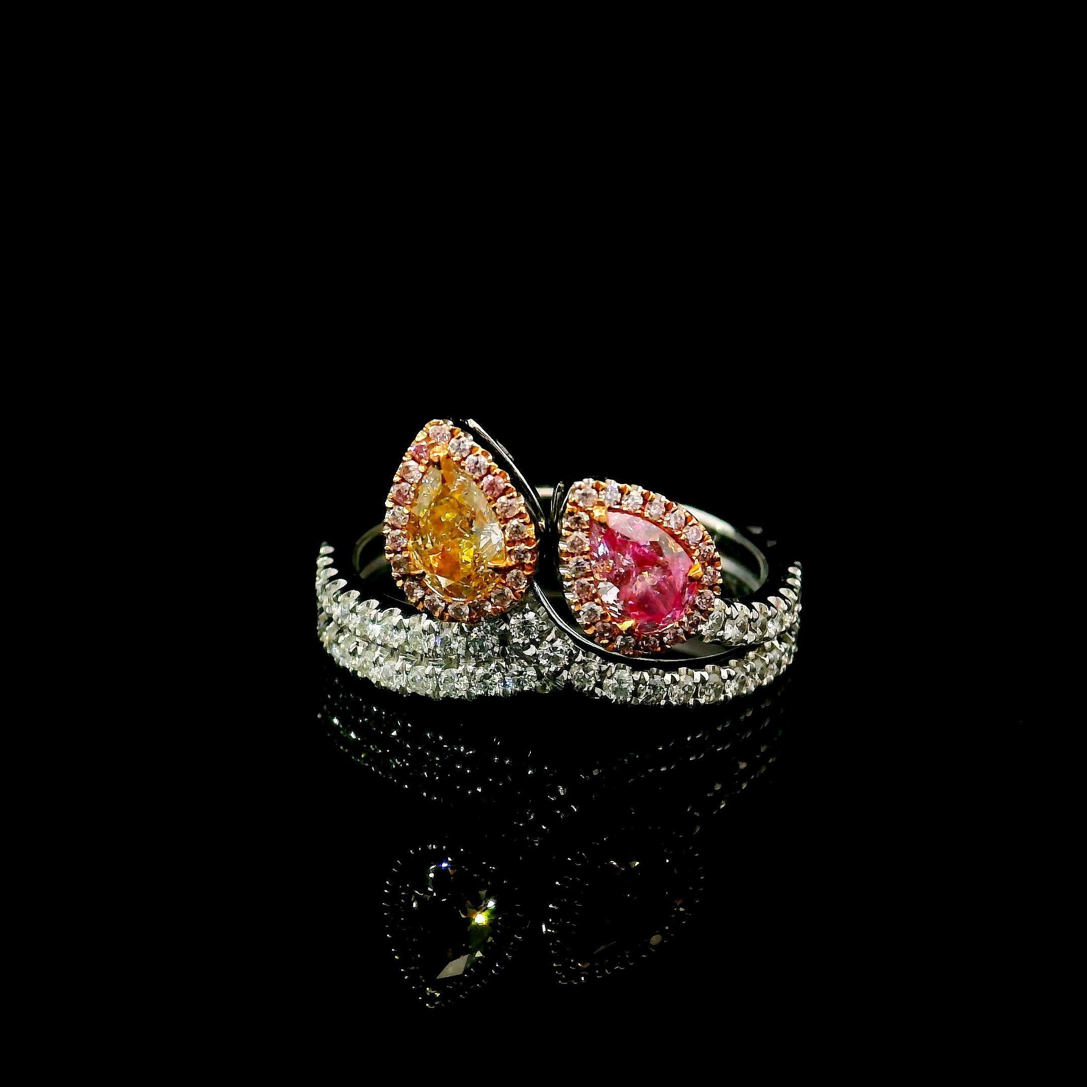 Anello in oro bianco 18 carati con diamanti
  
  Colore e caratura dell'oro: Oro bianco 18kt
  Peso: 4,91 grammi
  
  Imposta con...
  Tipo di pietra: Diamanti
  Forma: A pera
  Carati: 0,26 / 0,30
  Colore: Giallo tenue intenso / Rosa tenue
 