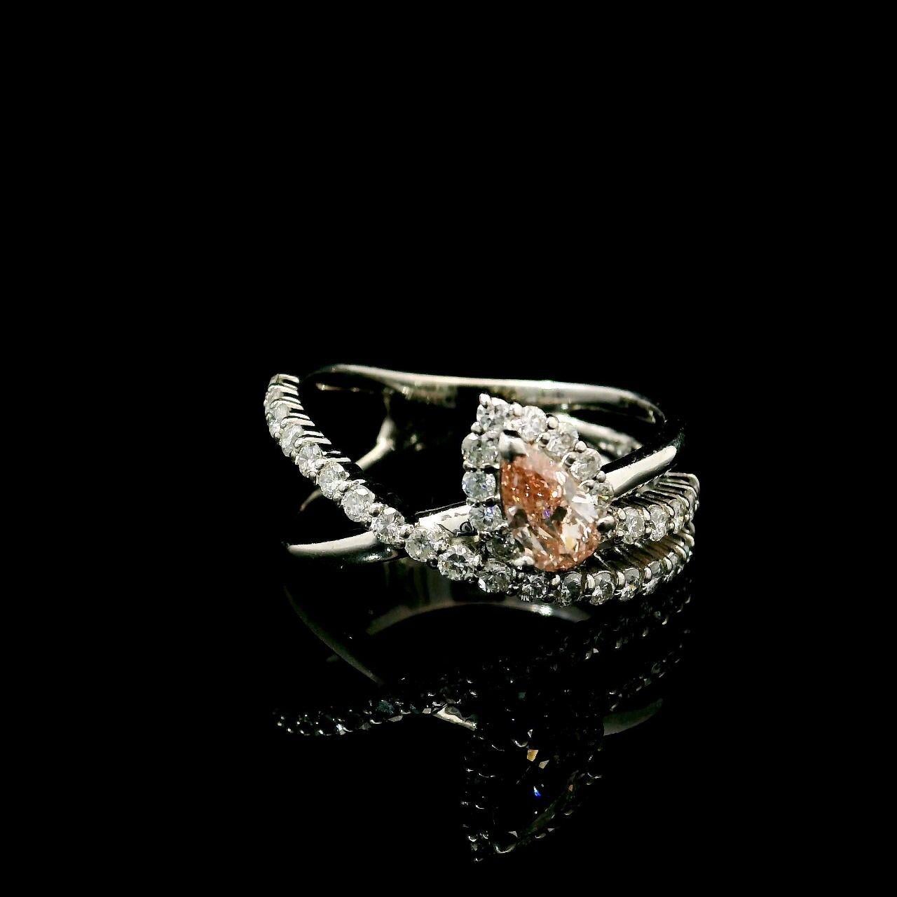 Pear Cut 0.272 Carat Very Light Pink SI1 Clarity Diamond Ring For Sale