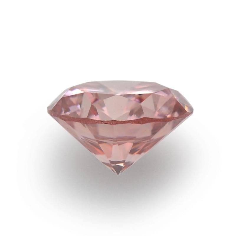 Diamante natural de color rosa parduzco fantasía redondo de 0,28 TCW certificado por GIA Moderno en venta