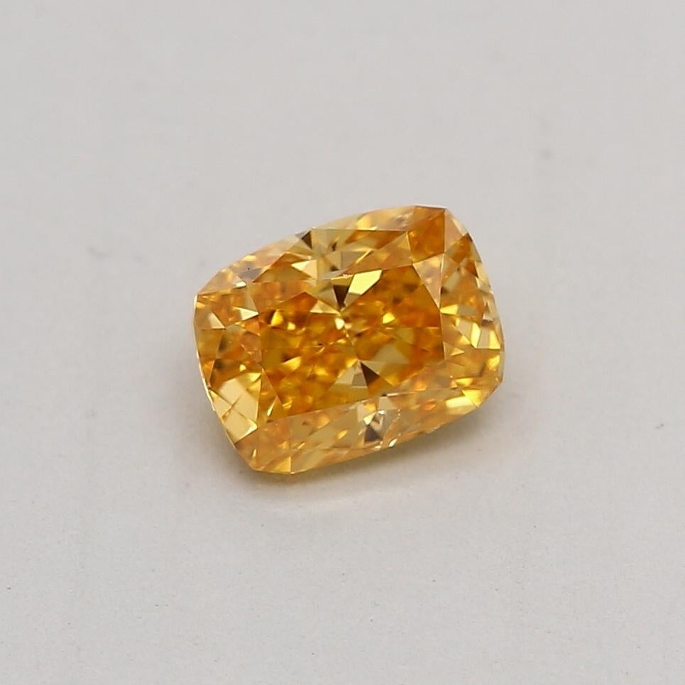 Certificate: GIA 
Report Number: 3445509453
Shape And Cut: Cushion
Carat Weight: 0.30 carat
Measurements: 4.37 x 3.36 x 2.37 mm
Color Grade: Fancy Vivid Orange Yellow

FEATURES OF THE DIAMOND:

This Fancy Vivid Orange Yellow Diamond is a rare and