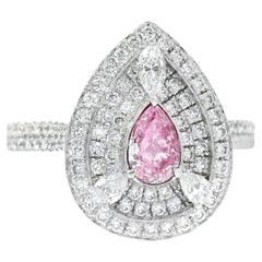 Anillo de diamantes con certificado GIA de 0,31 quilates de color rosa tenue y claridad SI2