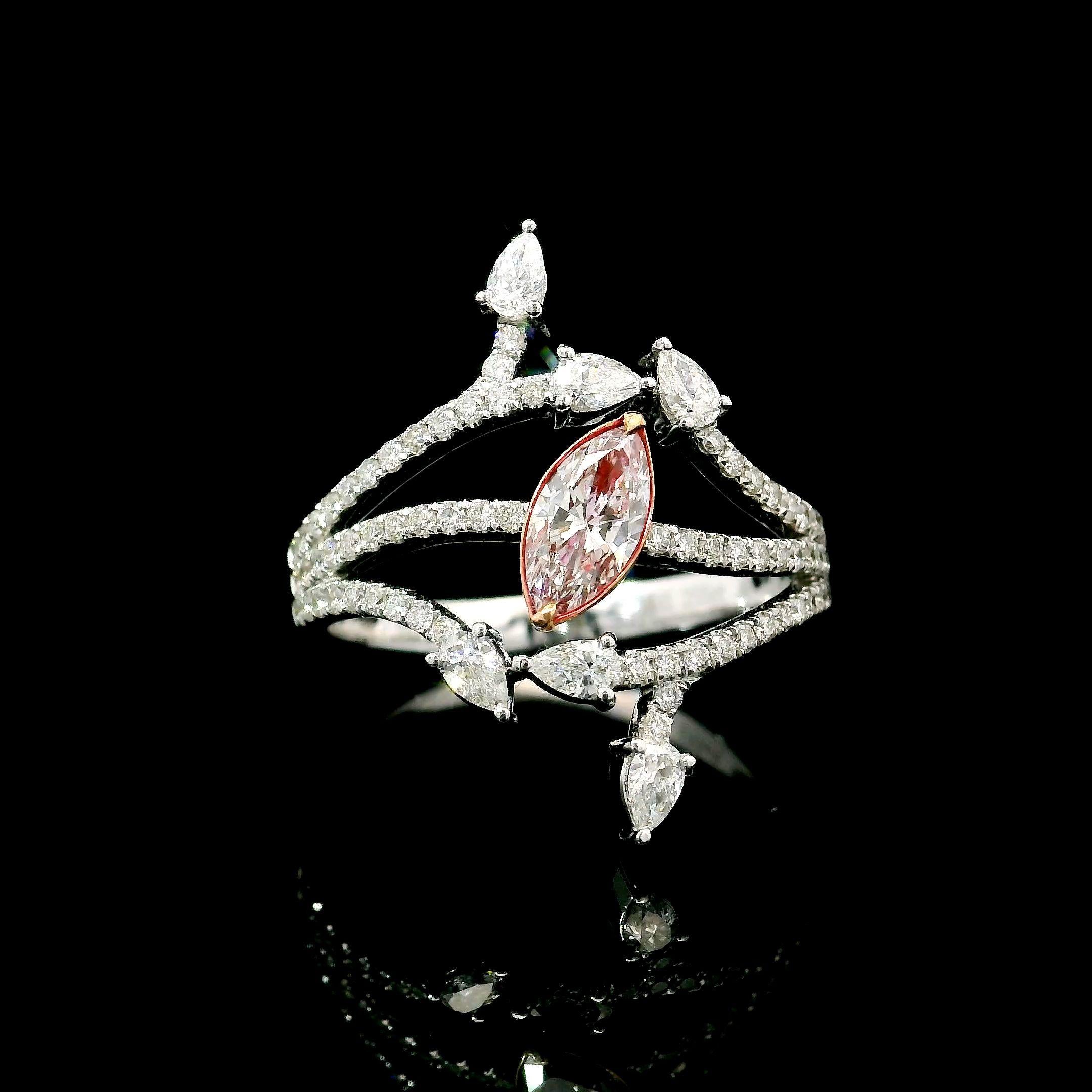 18kt white gold ring with diamonds
  
  Gold colour & karat: White gold 18kt
  Weight: 3.84 grams
  
  Set with-
  Stone type: Diamonds
  Shape: Marquise
  Carat: 0.31 ct
  Colour: Faint Pink
  Clarity: VS2
  
  Surrounding Stones: Diamonds
 1)