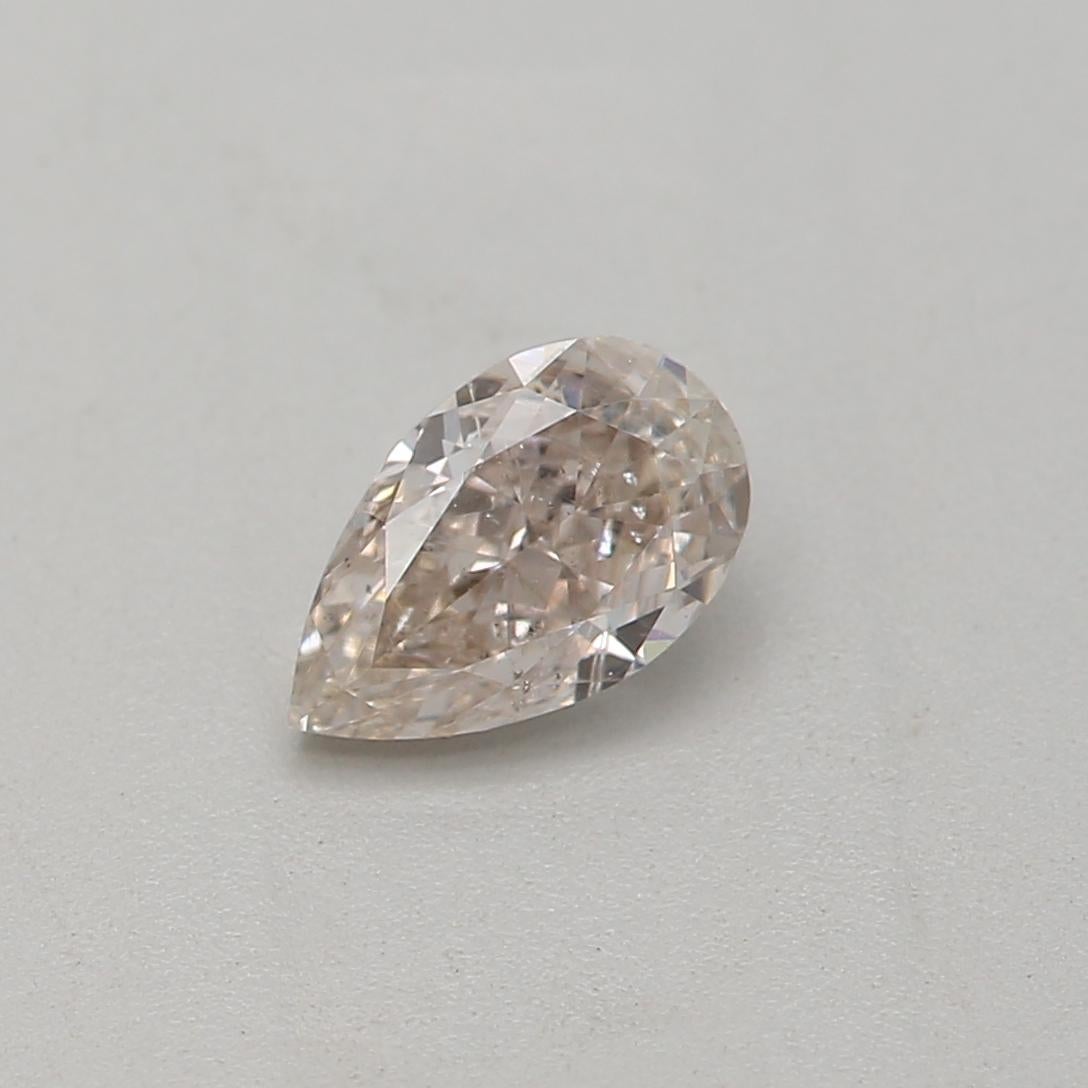 Certificate: GIA 
Report Number: 2434915444
Shape And Cut: Pear
Carat Weight: 0.31 carat
Measurements: 5.50 x 3.40 x 2.39 mm
Color Grade: Light Pinkish Brown

FEATURES OF THE DIAMOND:

This light pinkish brown diamond is a rare and captivating