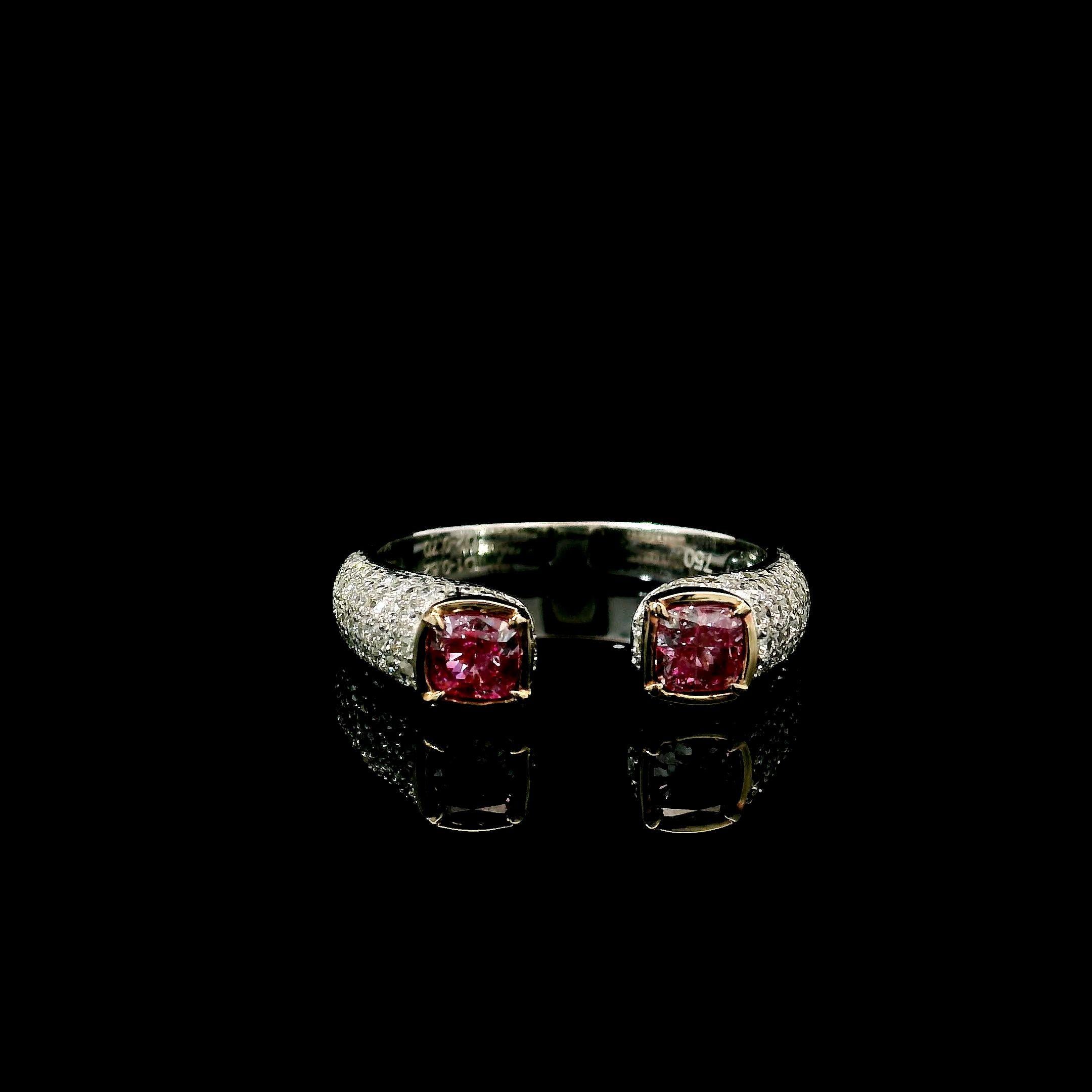 18kt white gold ring with diamonds
  
  Gold colour & karat: White gold 18kt
  Weight: 3.77 grams
  
  Set with-
  Stone type: Diamonds
  Shape: Cushion
  Carat: 0.31
  Colour: Faint Pink  
  Clarity: VS2 / SI1 

Report type and Number: 6432168405 /
