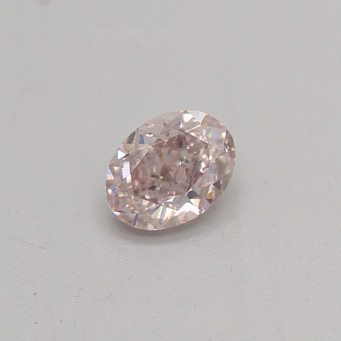 Certificate: GIA 
Report Number: 5436421820
Shape And Cut: Oval
Carat Weight: 0.32 carat
Measurements: 4.79 x 3.62 x 2.38 mm
Color Grade: Fancy Brownish Pink

FEATURES OF THE DIAMOND:

This fancy brownish pink diamond is a rare and captivating