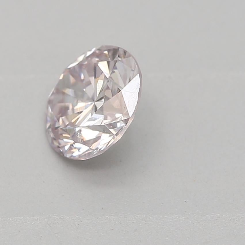 Round Cut GIA Certified 0.33 Carat Light Pink I1 Clarity Diamond For Sale