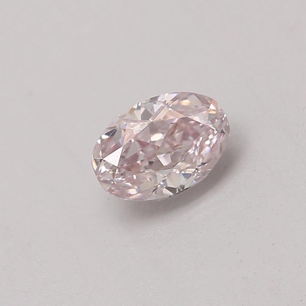 Certificate: GIA 
Report Number: 2477201217
Shape And Cut: Oval
Carat Weight: 0.34 carat
Measurements: 4.94 x 3.41 x 2.62 mm
Color Grade: Fancy Light Pink

FEATURES OF THE DIAMOND:

This fancy light pink diamond is a rare and stunning diamond that