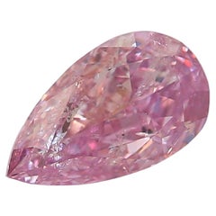 Diamante certificado por GIA de 0,34 quilates de color rosa violáceo fantasía y claridad I2