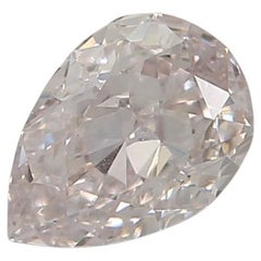 Diamante certificado por el GIA de 0,34 quilates de color rosa muy claro y claridad VS1
